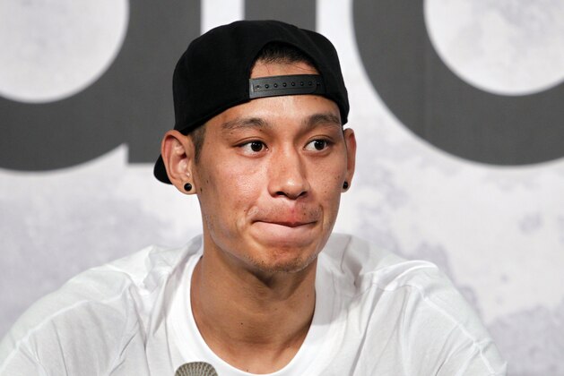NBA Brooklyn Nets guard Jeremy Lin answers questions during a media event in Taipei, Taiwan, Sunday, July 16, 2017. Lin is in Taiwan to host basketball clinics and media events. (AP Photo/Chiang Ying-ying)