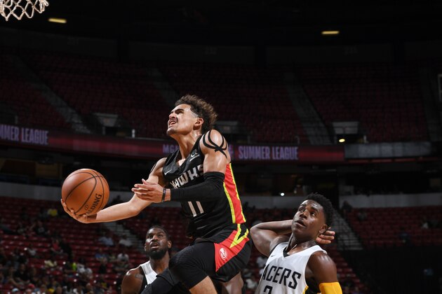 LAS VEGAS, NV - JULY 11:  Trae Young #11 of the Atlanta Hawks shoots the ball against the Indiana Pacers during the 2018 Las Vegas Summer League on July 11, 2018 at the Thomas & Mack Center in Las Vegas, Nevada. NOTE TO USER: User expressly acknowledges and agrees that, by downloading and or using this Photograph, user is consenting to the terms and conditions of the Getty Images License Agreement. Mandatory Copyright Notice: Copyright 2018 NBAE (Photo by Garrett Ellwood/NBAE via Getty Images)