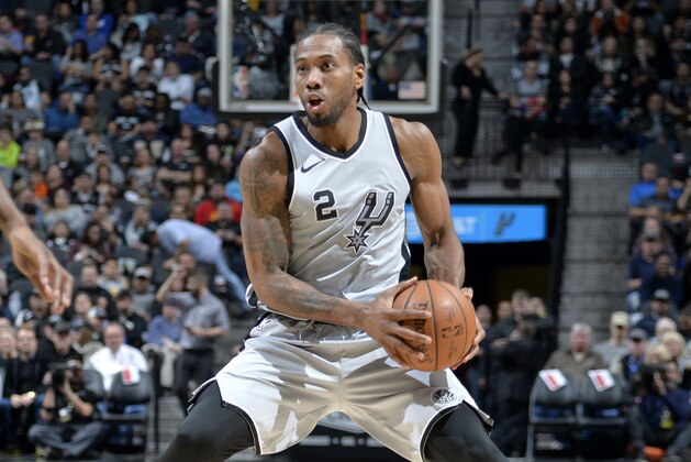 SAN ANTONIO, TX - JANUARY 13:  Kawhi Leonard #2 of the San Antonio Spurs handles the ball against the Denver Nuggets on January 13, 2018 at the AT&T Center in San Antonio, Texas. NOTE TO USER: User expressly acknowledges and agrees that, by downloading and or using this photograph, user is consenting to the terms and conditions of the Getty Images License Agreement. Mandatory Copyright Notice: Copyright 2018 NBAE (Photos by Mark Sobhani/NBAE via Getty Images)