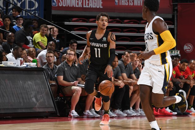 LAS VEGAS, NV - JULY 11:  Trae Young #11 of the Atlanta Hawks handles the ball against the Indiana Pacers during the 2018 Las Vegas Summer League on July 11, 2018 at the Thomas & Mack Center in Las Vegas, Nevada. NOTE TO USER: User expressly acknowledges and agrees that, by downloading and or using this Photograph, user is consenting to the terms and conditions of the Getty Images License Agreement. Mandatory Copyright Notice: Copyright 2018 NBAE (Photo by Garrett Ellwood/NBAE via Getty Images)