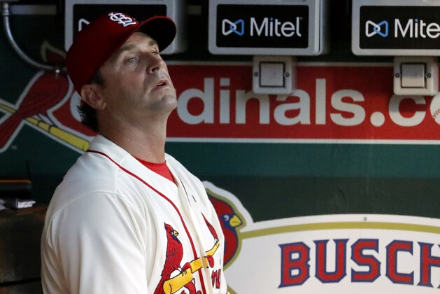 St. Louis Cardinals manager Mike Matheny watches from the dugout during the sixth inning of a baseball game against the Atlanta Braves Saturday, June 30, 2018, in St. Louis. (AP Photo/Jeff Roberson)