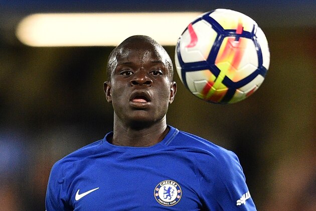 Chelsea's French midfielder N'Golo Kante chases the ball during the English Premier League football match between Chelsea and Huddersfield Town at Stamford Bridge in London on May 9, 2018. (Photo by Glyn KIRK / AFP) / RESTRICTED TO EDITORIAL USE. No use with unauthorized audio, video, data, fixture lists, club/league logos or 'live' services. Online in-match use limited to 75 images, no video emulation. No use in betting, games or single club/league/player publications. /         (Photo credit should read GLYN KIRK/AFP/Getty Images)