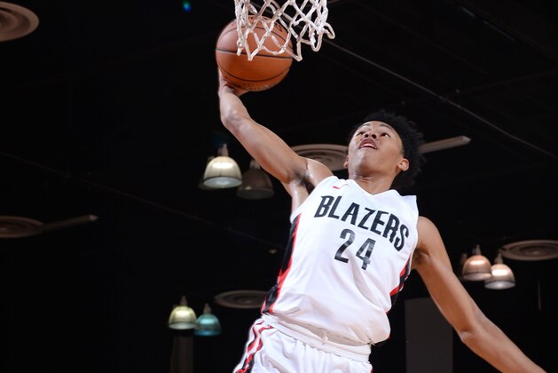 LAS VEGAS, NV - JULY 10: Anfernee Simons #24 of the Portland Trail Blazers dunks the ball against the San Antonio Spurs during the 2018 Las Vegas Summer League on July 10, 2018 at the Cox Pavilion in Las Vegas, Nevada. NOTE TO USER: User expressly acknowledges and agrees that, by downloading and/or using this photograph, user is consenting to the terms and conditions of the Getty Images License Agreement. Mandatory Copyright Notice: Copyright 2018 NBAE (Photo by Bart Young/NBAE via Getty Images)