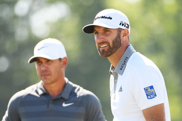 SOUTHAMPTON, NY - JUNE 17: Brooks Koepka of the United States (L) and Dustin Johnson of the United States (R) look on from the ninth tee during the final round of the 2018 U.S. Open at Shinnecock Hills Golf Club on June 17, 2018 in Southampton, New York.  (Photo by Ross Kinnaird/Getty Images)