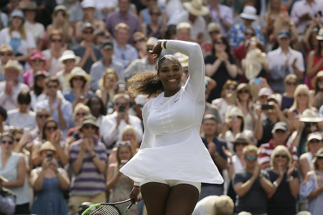 Serena Williams of the United States celebrates defeating Germany's Julia Gorges in their women's singles semifinals match at the Wimbledon Tennis Championships, in London, Thursday July 12, 2018.(AP Photo/Tim Ireland)