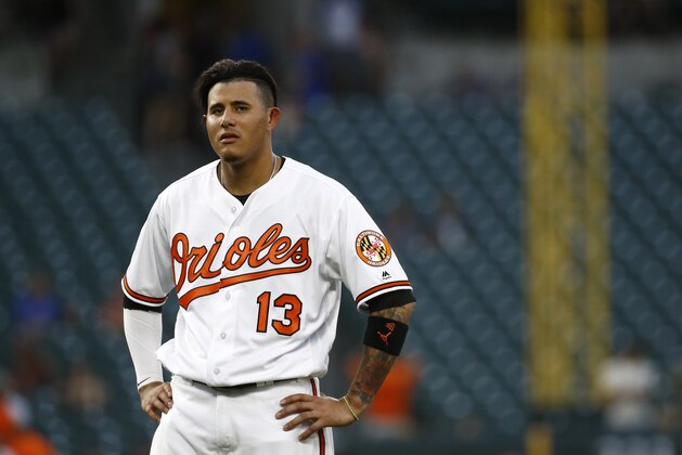 Baltimore Orioles' Manny Machado walks on the field after an at-bat during a baseball game against the New York Yankees, Tuesday, July 10, 2018, in Baltimore. (AP Photo/Patrick Semansky)