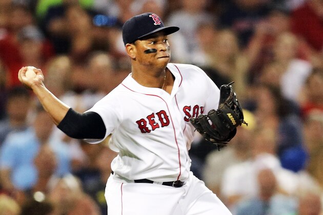 BOSTON, MA - JULY 9:  Rafael Devers #11 of the Boston Red Sox throws to second base in the fifth inning of a game against the Texas Rangers at Fenway Park on July 9, 2018 in Boston, Massachusetts.  (Photo by Adam Glanzman/Getty Images)