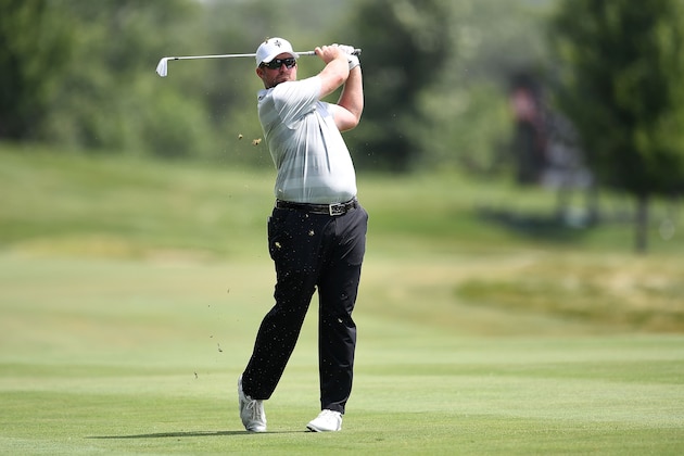 SILVIS, IL - JULY 12:  Steve Wheatcroft hits his approach shot on the 18th hole during the first round of the John Deere Classic at TPC Deere Run on July 12, 2018 in Silvis, Illinois.  (Photo by Stacy Revere/Getty Images)