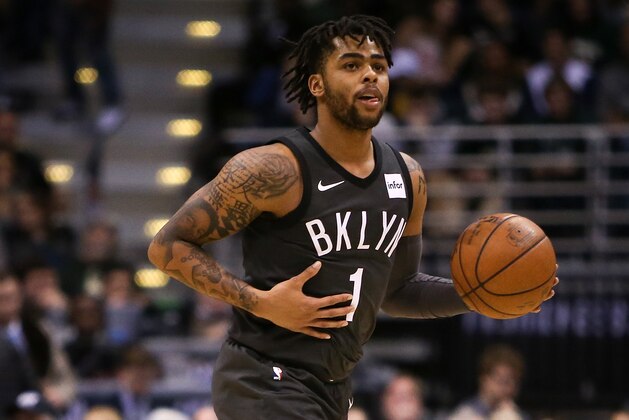 MILWAUKEE, WI - APRIL 05:  D'Angelo Russell #1 of the Brooklyn Nets dribbles the ball in the second quarter against the Milwaukee Bucks at the Bradley Center on April 5, 2018 in Milwaukee, Wisconsin. NOTE TO USER: User expressly acknowledges and agrees that, by downloading and or using this photograph, User is consenting to the terms and conditions of the Getty Images License Agreement. (Dylan Buell/Getty Images) *** Local Caption *** D'Angelo Russell