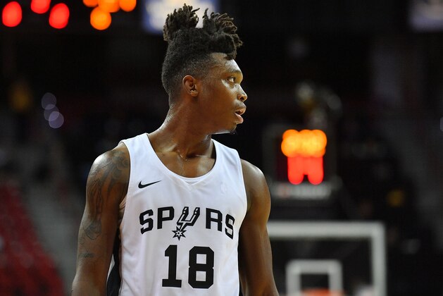 LAS VEGAS, NV - JULY 08:  Lonnie Walker IV #18 of the San Antonio Spurs stands on the court during his team's game against the Washington Wizards during the 2018 NBA Summer League at the Thomas & Mack Center on July 8, 2018 in Las Vegas, Nevada. NOTE TO USER: User expressly acknowledges and agrees that, by downloading and or using this photograph, User is consenting to the terms and conditions of the Getty Images License Agreement.  (Photo by Sam Wasson/Getty Images)