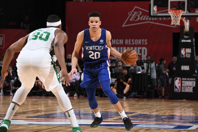LAS VEGAS, NV - JULY 12:  Kevin Knox #20 of the New York Knicks handles the ball against the Boston Celtics during the 2018 Las Vegas Summer League on July 12, 2018 at the Thomas & Mack Center in Las Vegas, Nevada. NOTE TO USER: User expressly acknowledges and agrees that, by downloading and/or using this Photograph, user is consenting to the terms and conditions of the Getty Images License Agreement. Mandatory Copyright Notice: Copyright 2018 NBAE (Photo by Garrett Ellwood/NBAE via Getty Images)