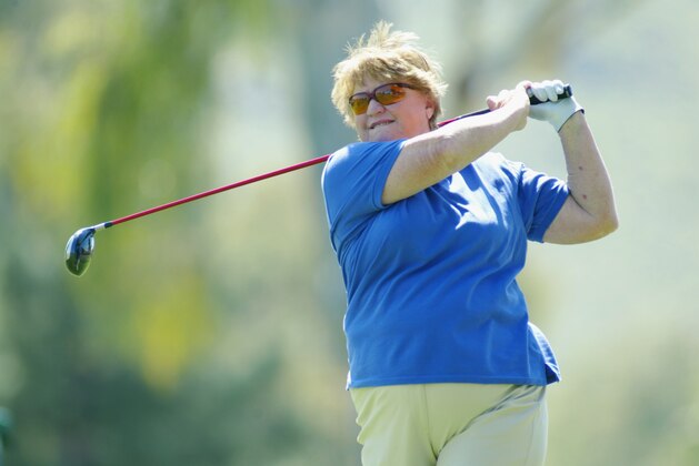 PHOENIX - MARCH 20:  Joanne Carner hits a shot during the first round of the SAFEWAY PING at Moon Valley C.C. on March 20, 2003 in Phoenix, Arizona.  (Photo by Scott Halleran/Getty Images)