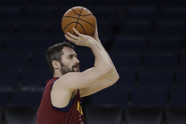 Cleveland Cavaliers' Kevin Love shoots during an NBA basketball practice, Wednesday, May 30, 2018, in Oakland, Calif. The Cavaliers face the Golden State Warriors in Game 1 of the NBA Finals on Thursday in Oakland. (AP Photo/Marcio Jose Sanchez)