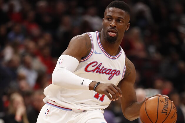 Chicago Bulls forward David Nwaba (11) dribbles the ball against the Detroit Pistons during the second half of an NBA basketball game in Chicago, Wednesday, April 11, 2018. (AP Photo/Jeff Haynes)