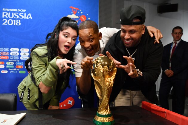 MOSCOW, RUSSIA - JULY 13:  Era Istrefi, Will Smith and Nicky Jam pose with the World Cup trophy at a closing ceremony press conference during the 2018 FIFA World Cup at Luzhniki Stadium on July 13, 2018 in Moscow, Russia.  (Photo by Dan Mullan/Getty Images)