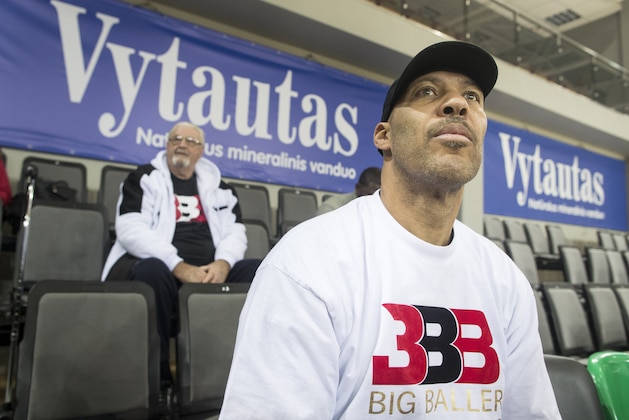 The father of American basketball players LiAngelo and LaMelo,  LaVar Ball attends during the training session at the BC Prienai-Birstonas Vytautas arena in Prienai, Lithuania, Friday, Jan. 5, 2018. LiAngelo Ball and LaMelo Ball have signed a one-year contract to play for Lithuanian professional basketball club Prienai - Birstonas Vytautas, in the southern Lithuania town of Prienai, some 110 km (68 miles) from the Lithuanian capital Vilnius.(AP Photo/Mindaugas Kulbis)