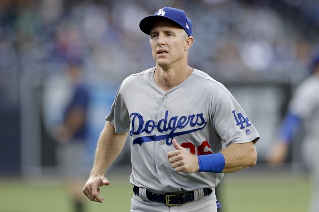 Los Angeles Dodgers second baseman Chase Utley looks on before a baseball game against the San Diego Padres Thursday, July 12, 2018, in San Diego. (AP Photo/Gregory Bull)