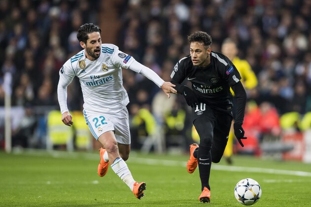 MADRID, SPAIN - FEBRUARY 14: Neymar da Silva Santos Junior, Neymar Jr (R), of Paris Saint Germain competes for the ball with Isco Alarcon of Real Madrid during the UEFA Champions League 2017-18 Round of 16 (1st leg) match between Real Madrid vs Paris Saint Germain at Estadio Santiago Bernabeu on February 14 2018 in Madrid, Spain. (Photo by Power Sport Images/Getty Images)