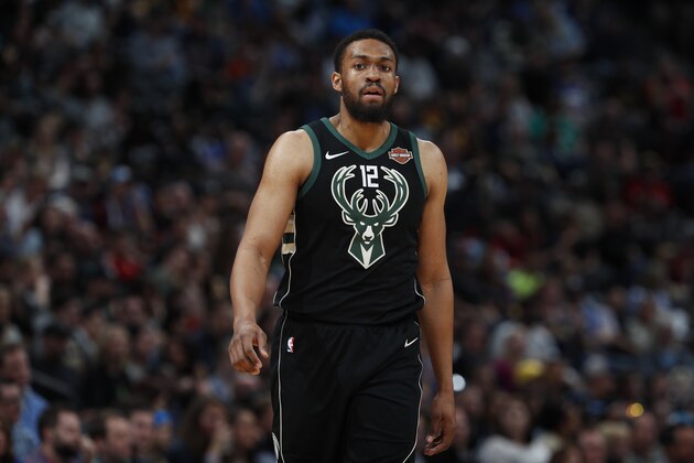 Milwaukee Bucks forward Jabari Parker (12) in the second half overtime of an NBA basketball game Sunday, April 1, 2018. The Nuggets won 128-125 in overtime. (AP Photo/David Zalubowski)