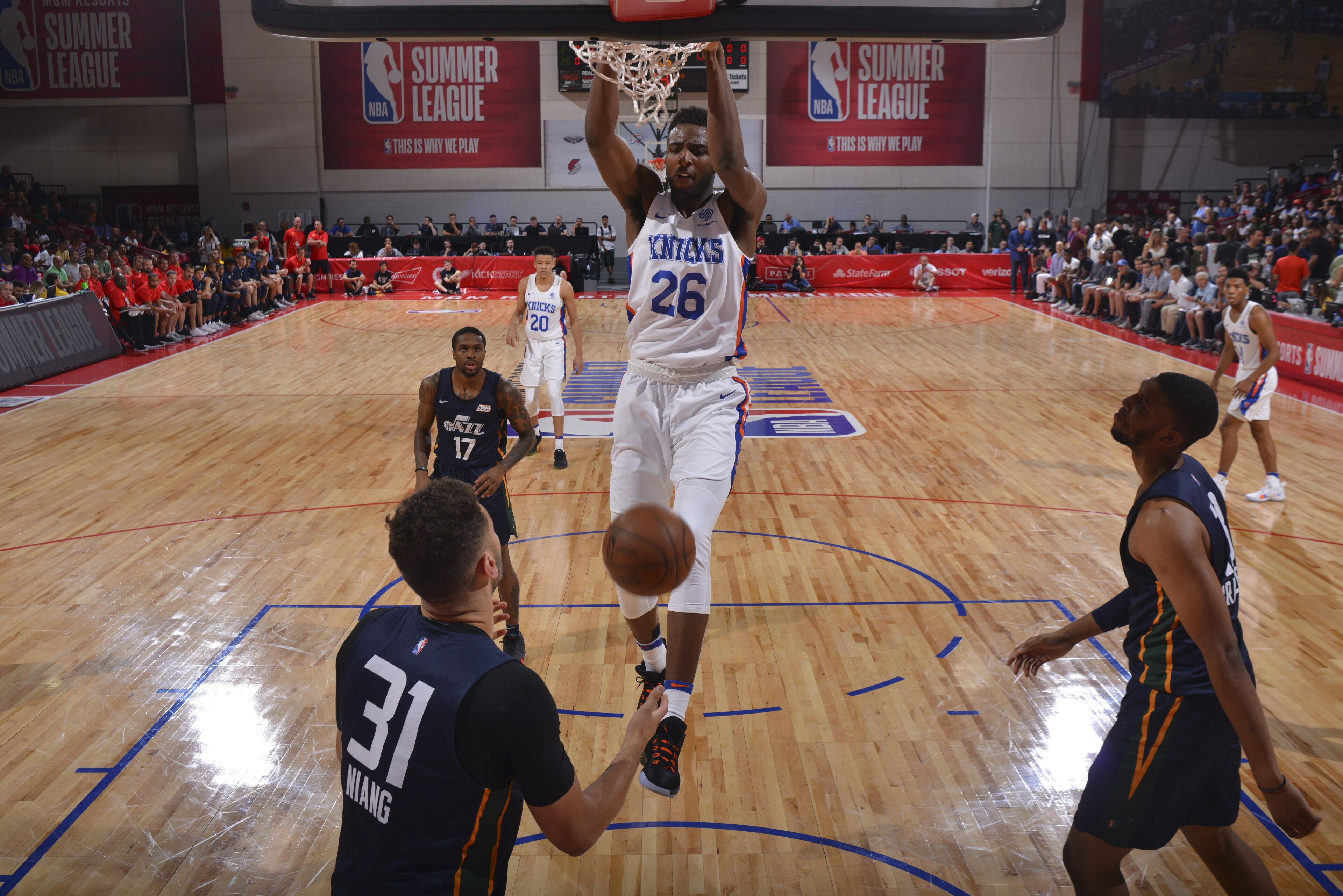 LAS VEGAS, NV - JULY 8: Mitchell Robinson #26 of the New York Knicks dunks the ball against the Utah Jazz during the 2018 Las Vegas Summer League on July 8, 2018 at the Cox Pavilion in Las Vegas, Nevada. NOTE TO USER: User expressly acknowledges and agrees that, by downloading and/or using this Photograph, user is consenting to the terms and conditions of the Getty Images License Agreement. Mandatory Copyright Notice: Copyright 2018 NBAE (Photo by Bart Young/NBAE via Getty Images) LAS VEGAS, NV - JULY 8: Mitchell Robinson #26 of the New York Knicks dunks the ball against the Utah Jazz during the 2018 Las Vegas Summer League on July 8, 2018 at the Cox Pavilion in Las Vegas, Nevada. NOTE TO USER: User expressly acknowledges and agrees that, by downloading and/or using this Photograph, user is consenting to the terms and conditions of the Getty Images License Agreement. Mandatory Copyright Notice: Copyright 2018 NBAE (Photo by Bart Young/NBAE via Getty Images)