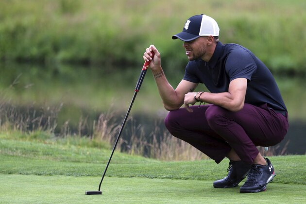 Golden State Warriors All-Star guard Stephen Curry lines up a putt on the first green during the first round at the American Century Golf Championship, Friday, July 13, 2018, at the Edgewood Tahoe Golf Course in Stateline, Nev. (AP Photo/Lance Iversen)
