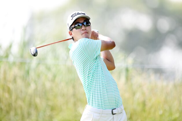 SILVIS, IL - JULY 13:  Michael Kim hits his tee shot on the 11th hole during the second round of the John Deere Classic at TPC Deere Run on July 13, 2018 in Silvis, Illinois.  (Photo by Stacy Revere/Getty Images)