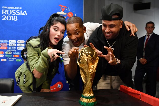 MOSCOW, RUSSIA - JULY 13:  Era Istrefi, Will Smith and Nicky Jam pose with the World Cup trophy at a closing ceremony press conference during the 2018 FIFA World Cup at Luzhniki Stadium on July 13, 2018 in Moscow, Russia.  (Photo by Dan Mullan/Getty Images)
