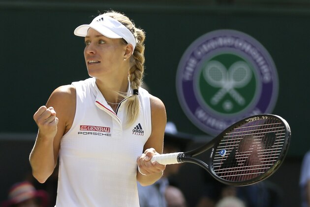Germany's Angelique Kerber celebrates defeating Latvia's Jelena Ostapenko during their women's singles semifinals match at the Wimbledon Tennis Championships, in London, Thursday July 12, 2018. (AP Photo/Tim Ireland)
