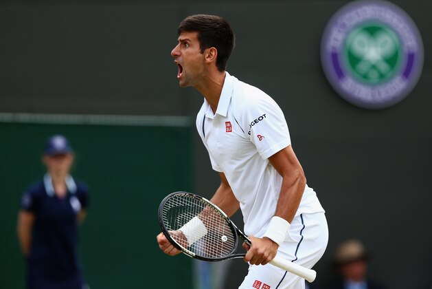 LONDON, ENGLAND - JULY 07:  Novak Djokovic of Serbia reacts in his Gentlemens Singles Fourth Round match against Kevin Anderson of South Africa during day eight of the Wimbledon Lawn Tennis Championships at the All England Lawn Tennis and Croquet Club on July 7, 2015 in London, England.  (Photo by Clive Brunskill/Getty Images)