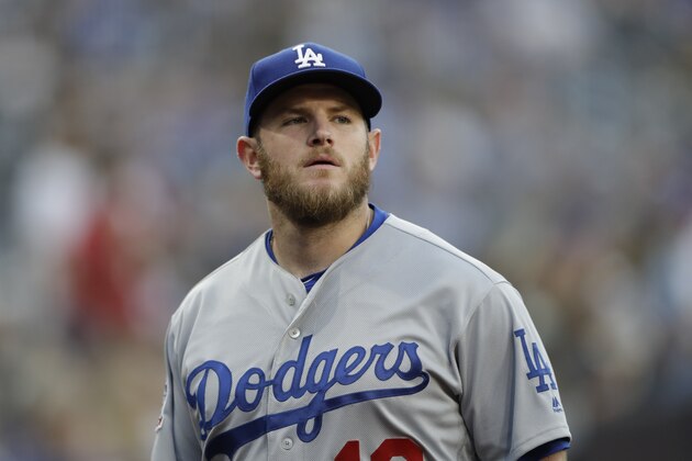 Los Angeles Dodgers first baseman Max Muncy looks on before a baseball game against the San Diego Padres Thursday, July 12, 2018, in San Diego. (AP Photo/Gregory Bull)