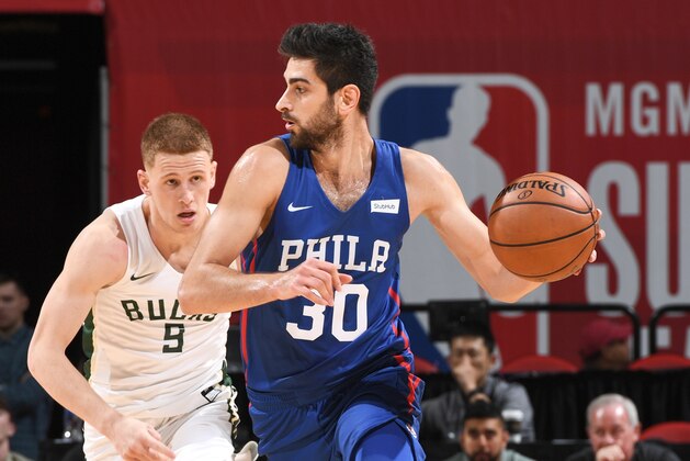 LAS VEGAS, NV - JULY 14: Furkan Korkmaz #30 of the Philadelphia 76ers handles the ball against the Milwaukee Bucks during the 2018 Las Vegas Summer League on July 14, 2018 at the Thomas & Mack Center in Las Vegas, Nevada. NOTE TO USER: User expressly acknowledges and agrees that, by downloading and/or using this photograph, user is consenting to the terms and conditions of the Getty Images License Agreement. Mandatory Copyright Notice: Copyright 2018 NBAE (Photo by Garrett Ellwood/NBAE via Getty Images)