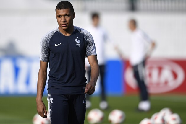 France's forward Kylian Mbappe attends a training session at the Luzhniki trining field in Moscow on July 14, 2018 on the eve of the Russia 2018 World Cup final football match between France and Croatia. (Photo by CHRISTOPHE SIMON / AFP) (Photo credit should read CHRISTOPHE SIMON/AFP/Getty Images) France's forward Kylian Mbappe attends a training session at the Luzhniki trining field in Moscow on July 14, 2018 on the eve of the Russia 2018 World Cup final football match between France and Croatia. (Photo by CHRISTOPHE SIMON / AFP) (Photo credit should read CHRISTOPHE SIMON/AFP/Getty Images)