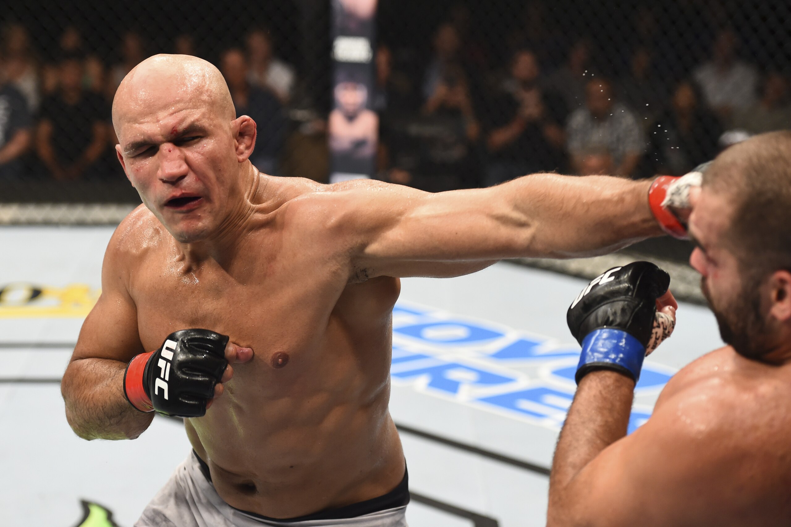 BOISE, ID - JULY 14:  (L-R) Junior Dos Santos of Brazil punches Blagoy Ivanov in their heavyweight fight during the UFC Fight Night event inside CenturyLink Arena on July 14, 2018 in Boise, Idaho. (Photo by Josh Hedges/Zuffa LLC/Zuffa LLC via Getty Images)