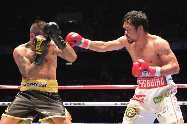 KUALA LUMPUR, MALAYSIA - JULY 15:  Manny Pacquiao of the Phillipines and Lucas Matthysse of Argintine in action on July 15, 2018 in Kuala Lumpur, Malaysia.  (Photo by How Foo Yeen/Getty Images)