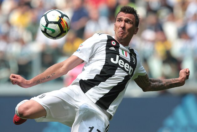 TURIN, ITALY - MAY 19:  Mario Mandzukic of Juventus FC kicks the ball during the serie A match between Juventus and Hellas Verona FC at Allianz Stadium on May 19, 2018 in Turin, Italy.  (Photo by Emilio Andreoli/Getty Images)