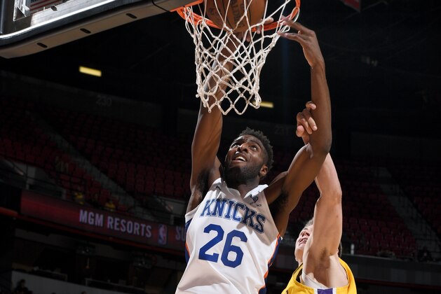 LAS VEAGS, NV - JULY 10: Mitchell Robinson #26 of the New York Knicks dunks against the Los Angeles Lakers during the 2018 Las Vegas Summer League on July 10, 2018 at the Thomas & Mack Center in Las Vegas, Nevada. NOTE TO USER: User expressly acknowledges and agrees that, by downloading and/or using this Photograph, user is consenting to the terms and conditions of the Getty Images License Agreement. Mandatory Copyright Notice: Copyright 2018 NBAE (Photo by Garrett Ellwood/NBAE via Getty Images)