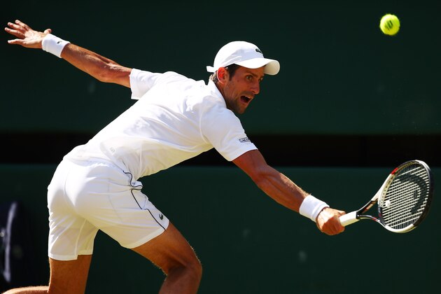 LONDON, ENGLAND - JULY 15: Novak Djokovic of Serbia returns against Kevin Anderson of South Africa during the Men's Singles final on day thirteen of the Wimbledon Lawn Tennis Championships at All England Lawn Tennis and Croquet Club on July 15, 2018 in London, England.  (Photo by Clive Brunskill/Getty Images)