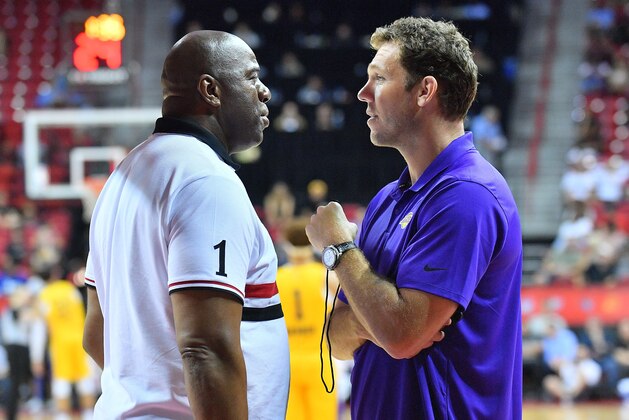 LAS VEGAS, NV - JULY 10:  Head coach Luke Walton of the Los Angeles Lakers talks with Los Angeles Lakers president of basketball operations Earvin 'Magic' Johnson during the 2018 NBA Summer League at the Thomas & Mack Center on July 10, 2018 in Las Vegas, Nevada. The Lakers defeated the Knicks 109-92. NOTE TO USER: User expressly acknowledges and agrees that, by downloading and or using this photograph, User is consenting to the terms and conditions of the Getty Images License Agreement.  (Photo by Sam Wasson/Getty Images)
