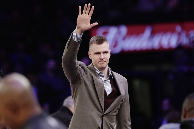 New York Knicks' Kristaps Porzingis (6) waves to fans before an NBA basketball game against the Dallas Mavericks Tuesday, March 13, 2018, in New York. (AP Photo/Frank Franklin II)