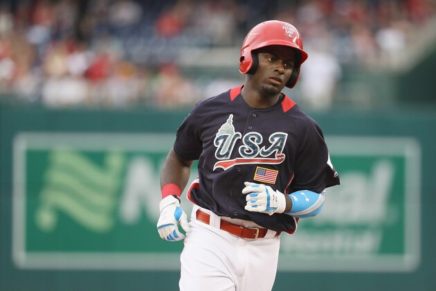 WASHINGTON, DC - JULY 15:  Taylor Trammell #5 of the Cincinnati Reds and the U.S. Team rounds the bases after hitting a solo home run in the sixth inning against the World Team during the SiriusXM All-Star Futures Game at Nationals Park on July 15, 2018 in Washington, DC.  (Photo by Rob Carr/Getty Images)