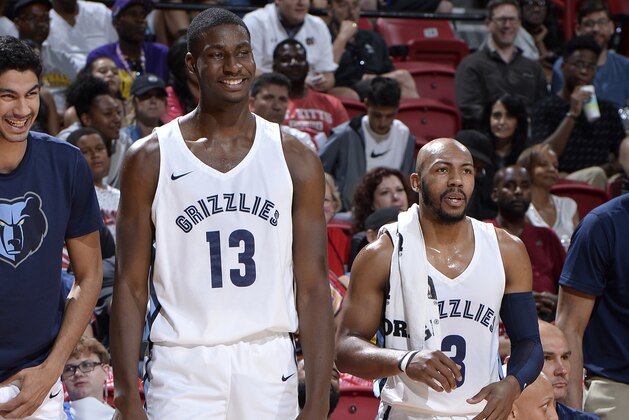 LAS VEGAS, NV - JULY 15: Jaren Jackson Jr. #13 and Jevon Carter #3 of the Memphis Grizzlies look on during the game against the Philadelphia 76ers during the 2018 Las Vegas Summer League on July 15, 2018 at the Thomas & Mack Center in Las Vegas, Nevada. NOTE TO USER: User expressly acknowledges and agrees that, by downloading and/or using this photograph, user is consenting to the terms and conditions of the Getty Images License Agreement. Mandatory Copyright Notice: Copyright 2018 NBAE (Photo by David Dow/NBAE via Getty Images)