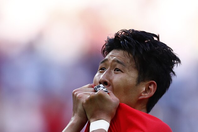 TOPSHOT - South Korea's forward Son Heung-min celebrates scoring his goal during the Russia 2018 World Cup Group F football match between South Korea and Germany at the Kazan Arena in Kazan on June 27, 2018. (Photo by BENJAMIN CREMEL / AFP) / RESTRICTED TO EDITORIAL USE - NO MOBILE PUSH ALERTS/DOWNLOADS        (Photo credit should read BENJAMIN CREMEL/AFP/Getty Images)