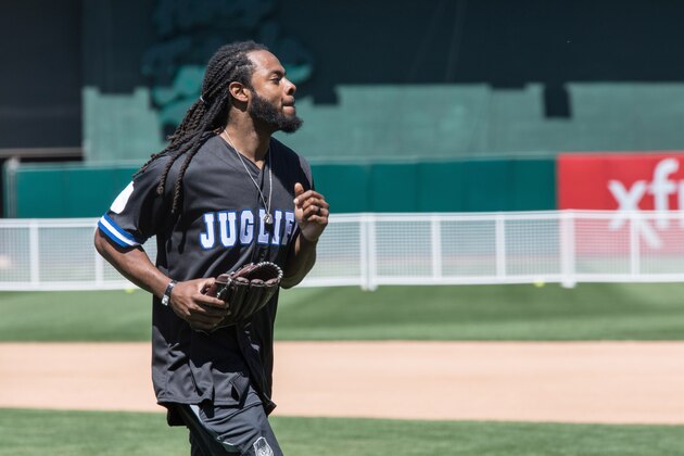OAKLAND, CA - JUNE 23:  San Francisco 49ers cornerback Richard Sherman plays in Water For Life Charity Softball Game at Oakland-Alameda County Coliseum on June 23, 2018 in Oakland, California.  (Photo by Miikka Skaffari/Getty Images)