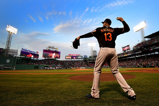 BOSTON, MA - APRIL 13:  Manny Machado #13 of the Baltimore Orioles warms up before a game against the Boston Red Sox at Fenway Park on April 13, 2018 in Boston, Massachusetts.  (Photo by Adam Glanzman/Getty Images)