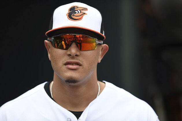 Baltimore Orioles' Manny Machado, waits in the dugout before being presented with his All-Star jersey before playing the Texas Rangers in a baseball game, Sunday, July 15, 2018, in Baltimore. (AP Photo/Gail Burton)