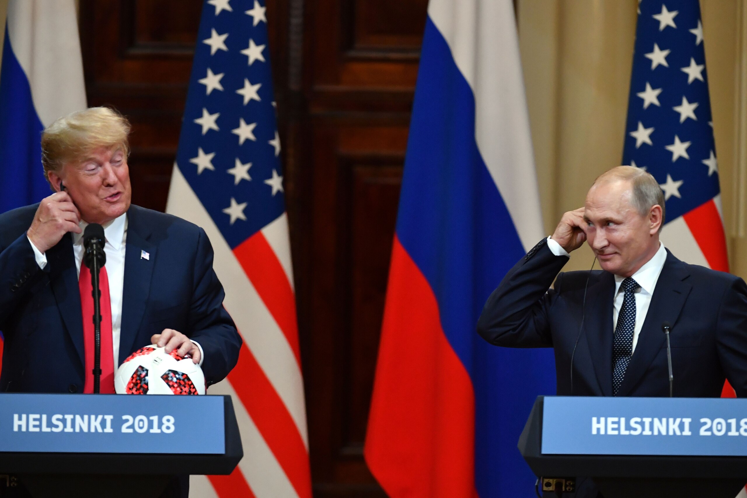 US President Donald Trump (L) and Russia's President Vladimir Putin smile as they attend a joint press conference after a meeting at the Presidential Palace in Helsinki, on July 16, 2018. - The US and Russian leaders opened an historic summit in Helsinki, with Donald Trump promising an 'extraordinary relationship' and Vladimir Putin saying it was high time to thrash out disputes around the world. (Photo by Yuri KADOBNOV / AFP) (Photo credit should read YURI KADOBNOV/AFP/Getty Images) US President Donald Trump (L) and Russia's President Vladimir Putin smile as they attend a joint press conference after a meeting at the Presidential Palace in Helsinki, on July 16, 2018. - The US and Russian leaders opened an historic summit in Helsinki, with Donald Trump promising an 'extraordinary relationship' and Vladimir Putin saying it was high time to thrash out disputes around the world. (Photo by Yuri KADOBNOV / AFP) (Photo credit should read YURI KADOBNOV/AFP/Getty Images)