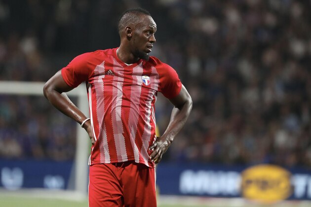NANTERRE, FRANCE - JUNE 12:  Usain Bolt of FIFA 98 reacts during the Friendly match between France 98 and FIFA 98 at U Arena on June 12, 2018 in Nanterre near Paris, France.  (Photo by Xavier Laine/Getty Images)