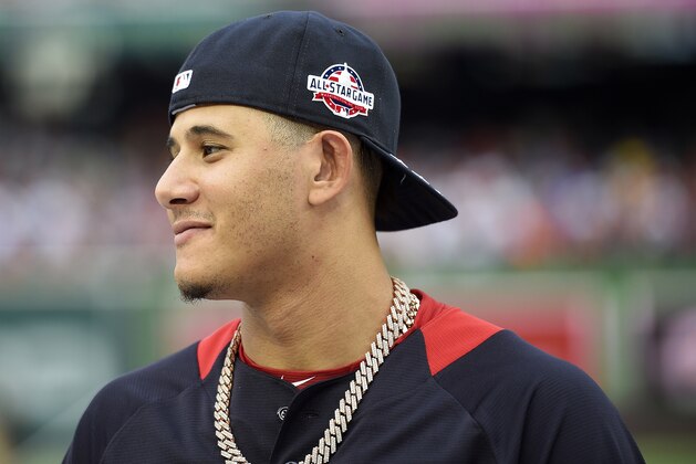 American League, Baltimore Orioles Manny Machado walks on the field after batting practice ahead of the All-Star Home Run Derby Baseball event, Monday, July 16, 2018, at Nationals Park, in Washington. The 89th MLB baseball All-Star Game will be played Tuesday. (AP Photo/Nick Wass)