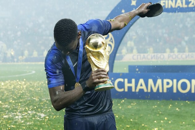 Paul Pogba of France dabs with the world cup trophy, FIFA World Cup during the 2018 FIFA World Cup Russia Final match between France and Croatia at the Luzhniki Stadium on July 15, 2018 in Moscow, Russia(Photo by VI Images via Getty Images)