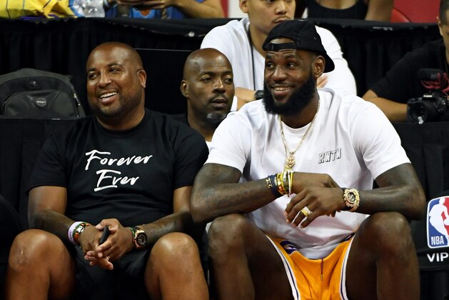 LAS VEGAS, NV - JULY 15:  Randy Mims (L) and LeBron James of the Los Angeles Lakers attend a quarterfinal game of the 2018 NBA Summer League between the Lakers and the Detroit Pistons at the Thomas & Mack Center on July 15, 2018 in Las Vegas, Nevada. NOTE TO USER: User expressly acknowledges and agrees that, by downloading and or using this photograph, User is consenting to the terms and conditions of the Getty Images License Agreement.  (Photo by Ethan Miller/Getty Images)